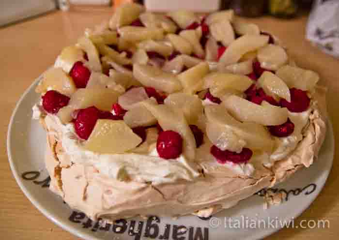 Pavlova with cream and red berries