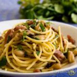 Spaghetti with herbs, bacon and dried beans