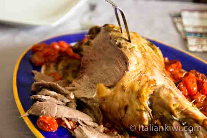 Roasted leg of lamb encrusted with rosemary and garlic