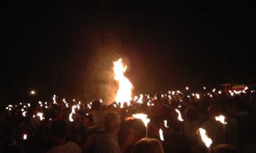 Jumping the St Jean Bonfire in Valbonne