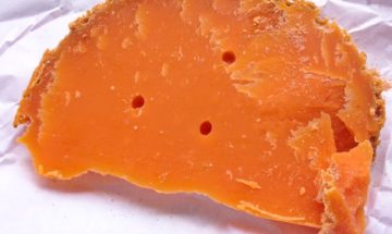 Orange mimolette cheese from Lille, France