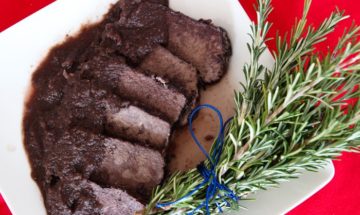 sliced Italian pot roast in Barolo sauce