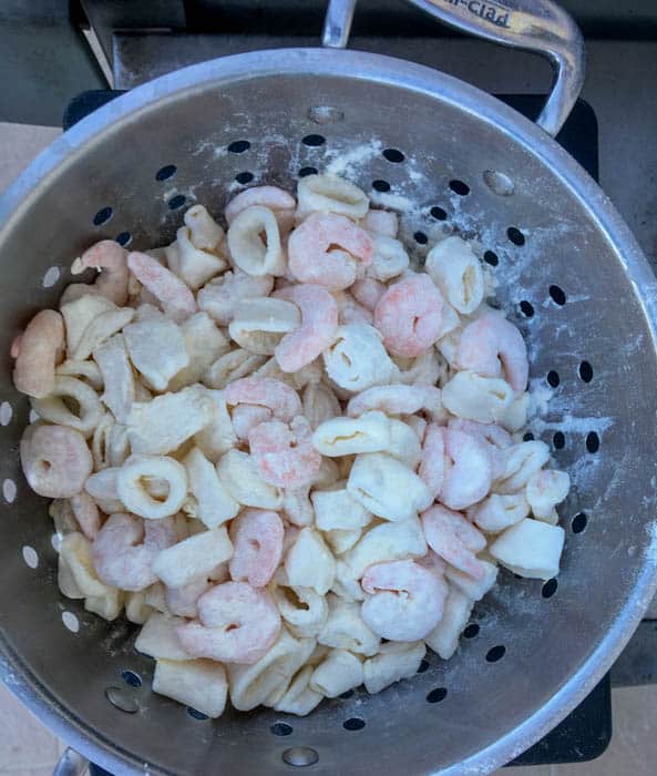 Drain the calamari in a sieve